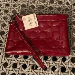Coach red patent wristlet